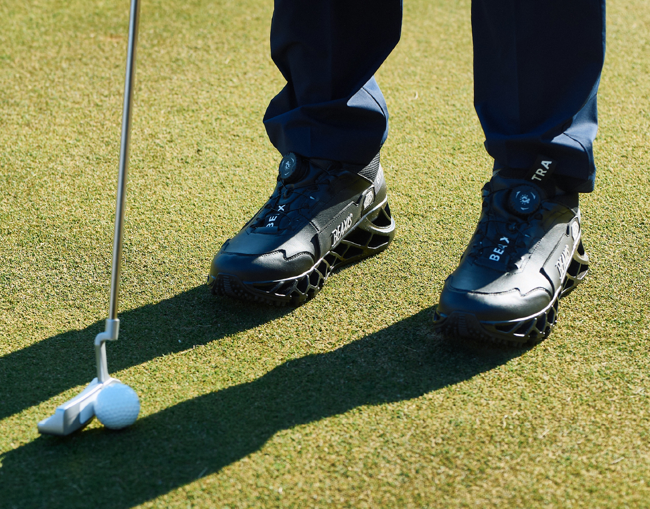 グリーン上のゴルファーの足元